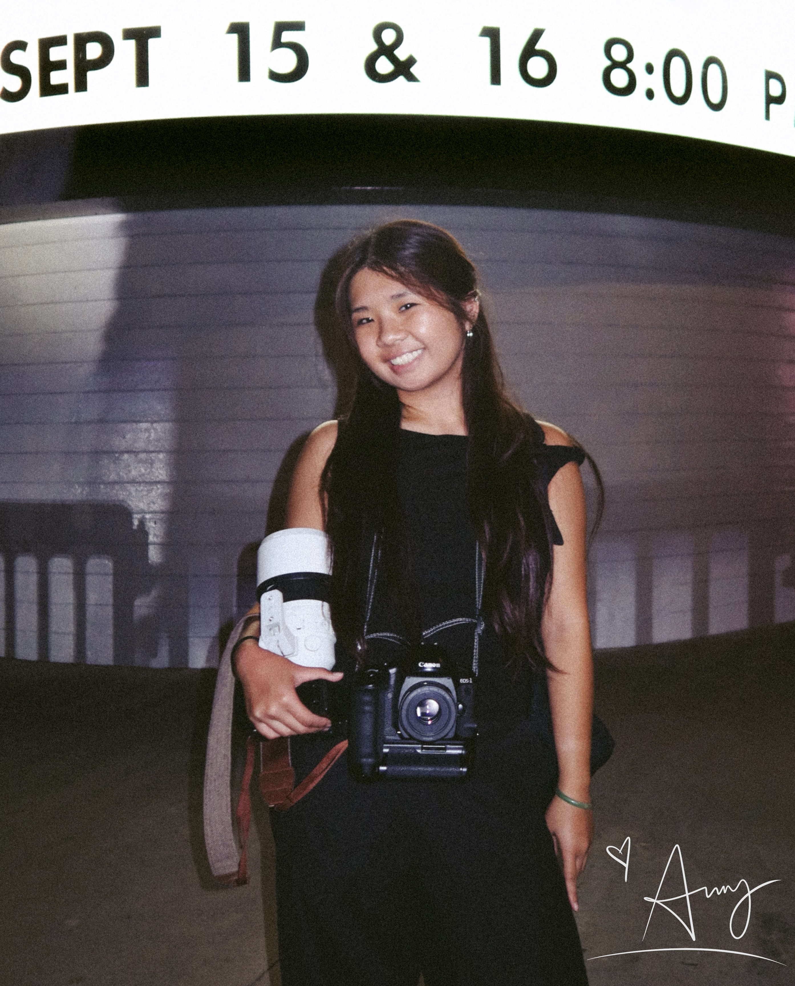Amy MyAn holding a camera